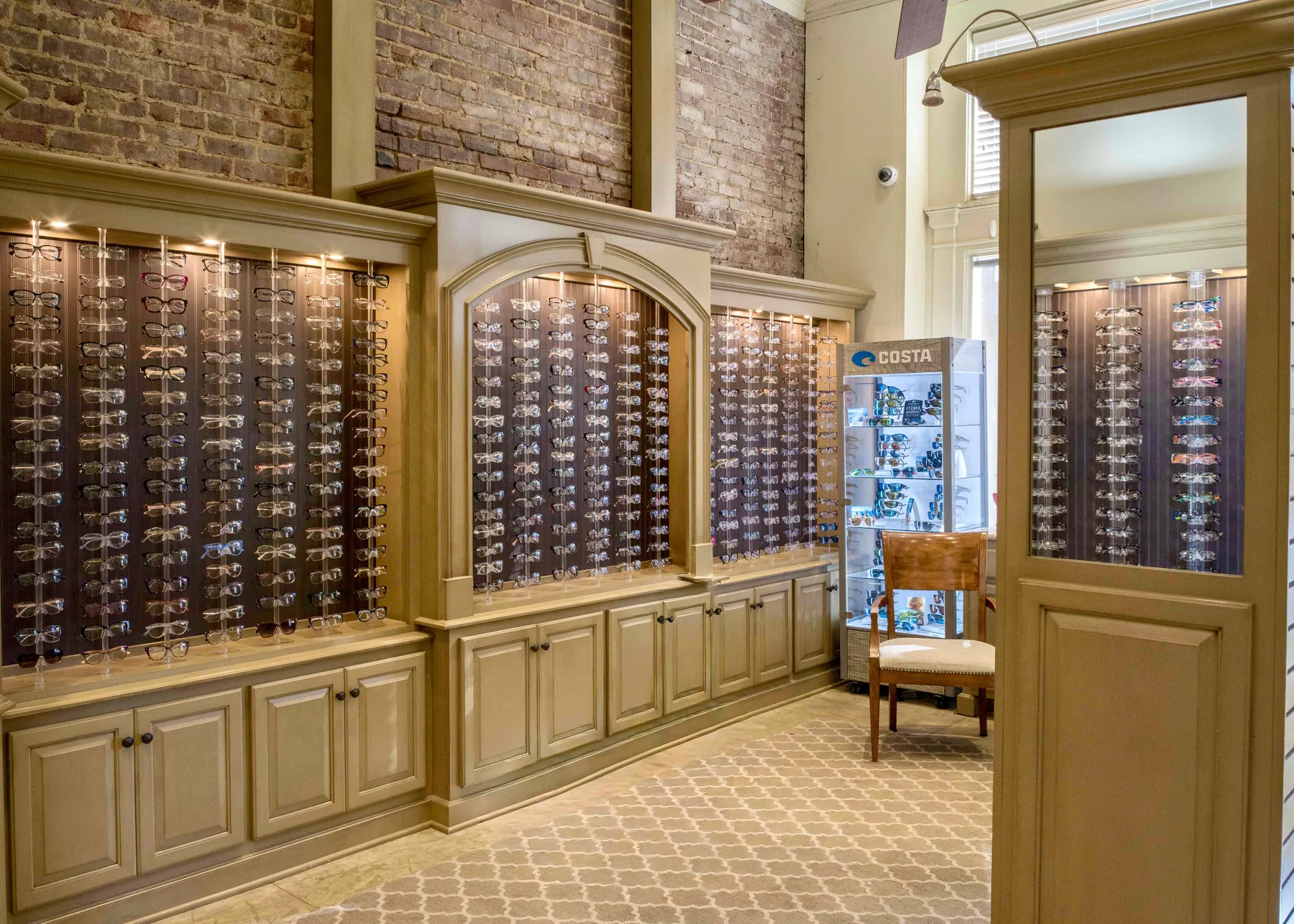 Designer sunglasses and frames on display at Wood Eye Clinic