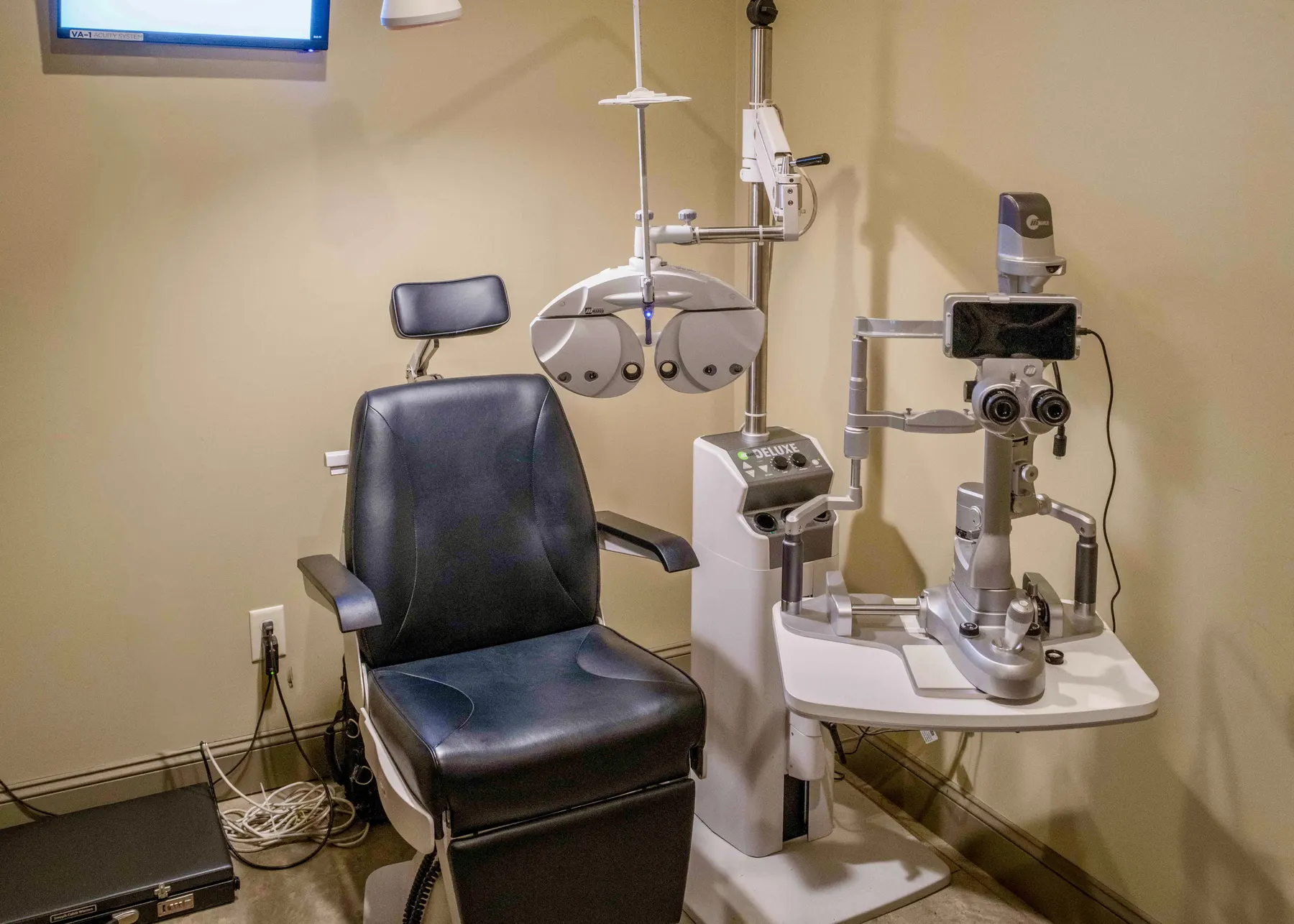 An exam room with advanced diagnostic equipment at Wood Eye Clinic