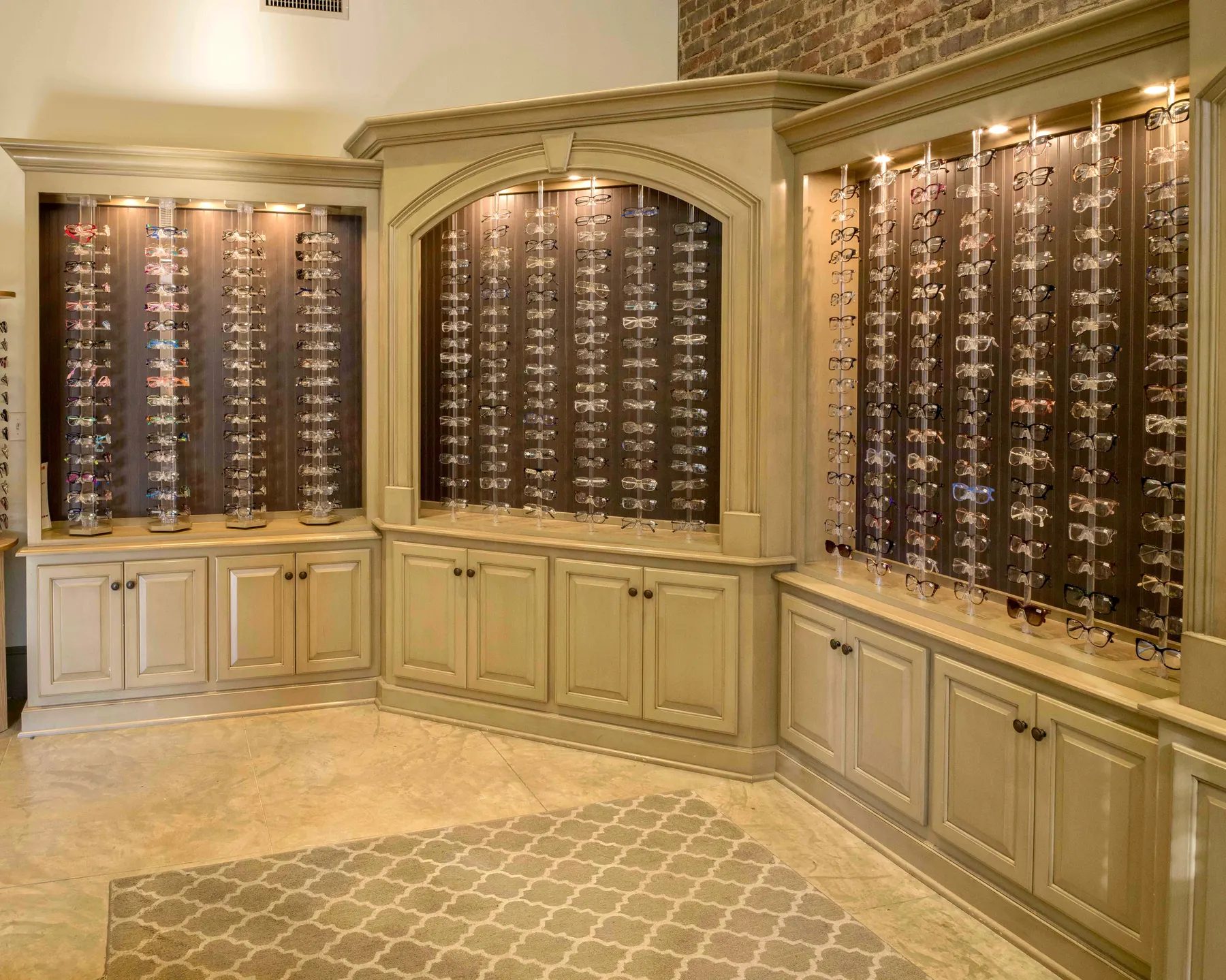 Walls of designer eyewear on display in the optical boutique at Wood Eye Clinic